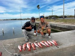 Casting for red snapper at South Padre Island Bay